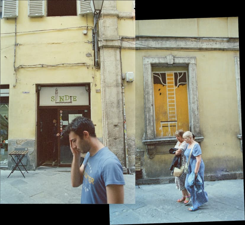 a man walking in front of a store that says s indie